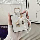 CASESUN Teddy Charm Case + Pearl Wrist Strap | Croc Texture for Z Flip 7/6/5/4/3